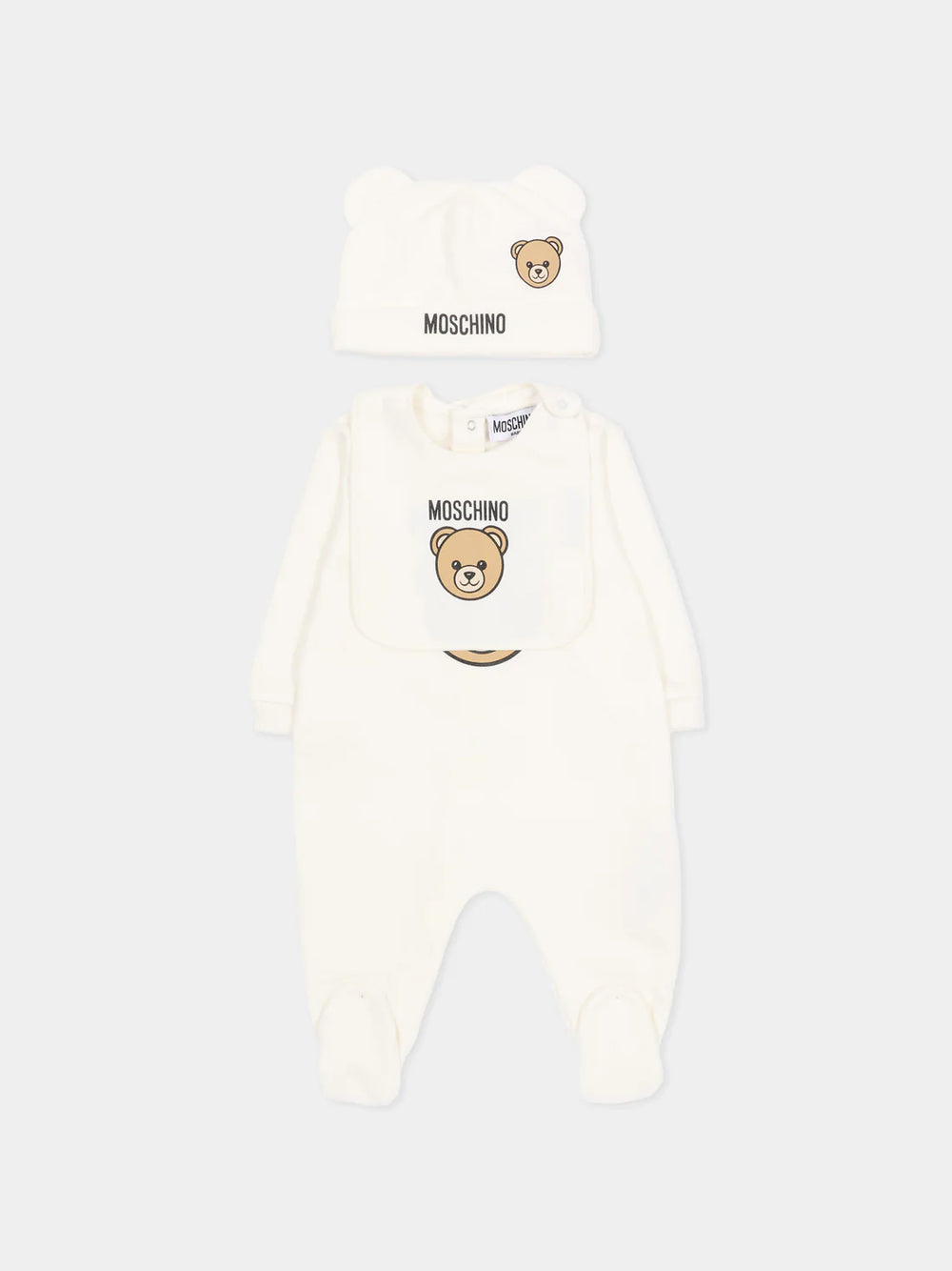 Set regalo composto di  tutina , cappello e bavaglino MUY097 LCA19 /10063 MOSCHINO 