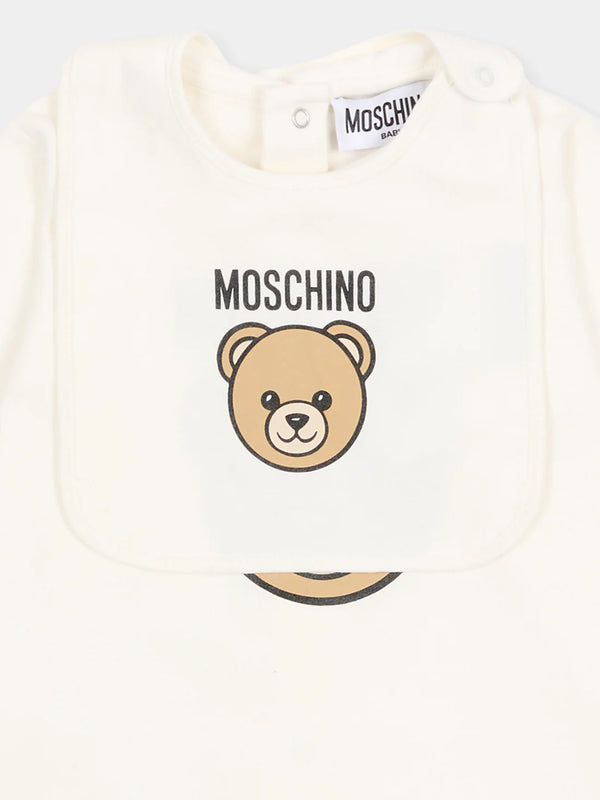 Set regalo composto di  tutina , cappello e bavaglino MUY097 LCA19 /10063 MOSCHINO 