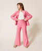 Pantaloni flare in crêpe con spacchi