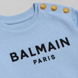 Felpa Balmain con bottoni oro sulla spalla — Dettaglio (Macro)
