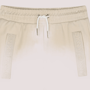 Pantaloni sportivi per bambina DKNY Kids sabbia  con logo D62368 /217 DKNY 