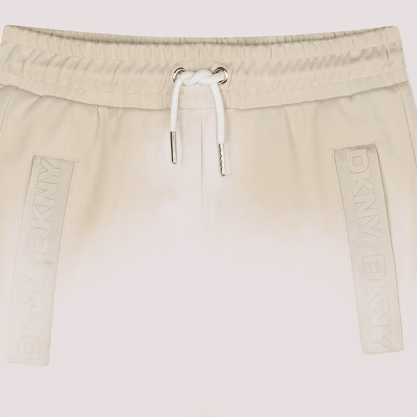 Pantaloni sportivi per bambina DKNY Kids sabbia  con logo D62368 /217 DKNY 