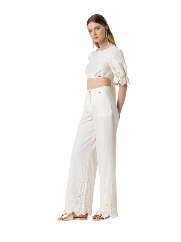 Pantaloni donna bianchi a gamba larga con ricami