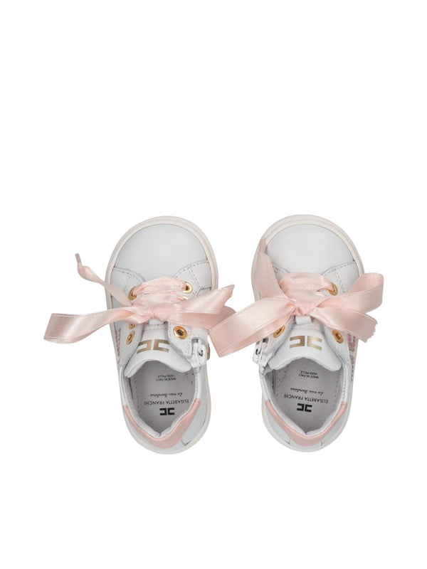 Sneakers bambina in pelle bianca con fiocchi e dettagli rosa