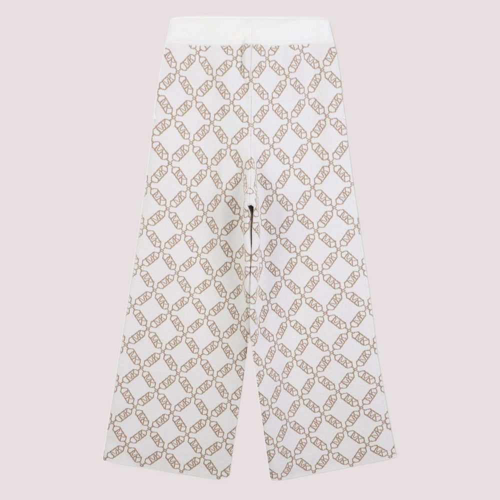 Pantaloni sportivi per bambina Michael Kors Kids bianchi con monogramma R30452 /N52 MICHAEL KORS 