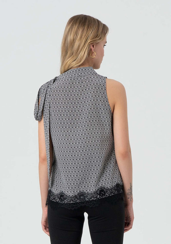 Top donna fantasia geometrica con dettaglio fiocco