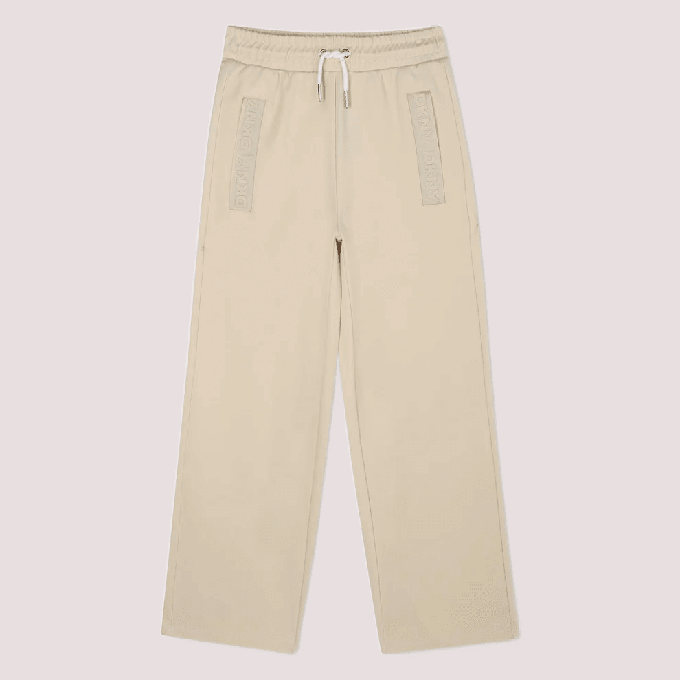 Pantaloni sportivi per bambina DKNY Kids sabbia  con logo D62368 /217 DKNY 