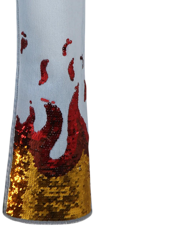 Jeans bambina light denim con fiamme in paillettes