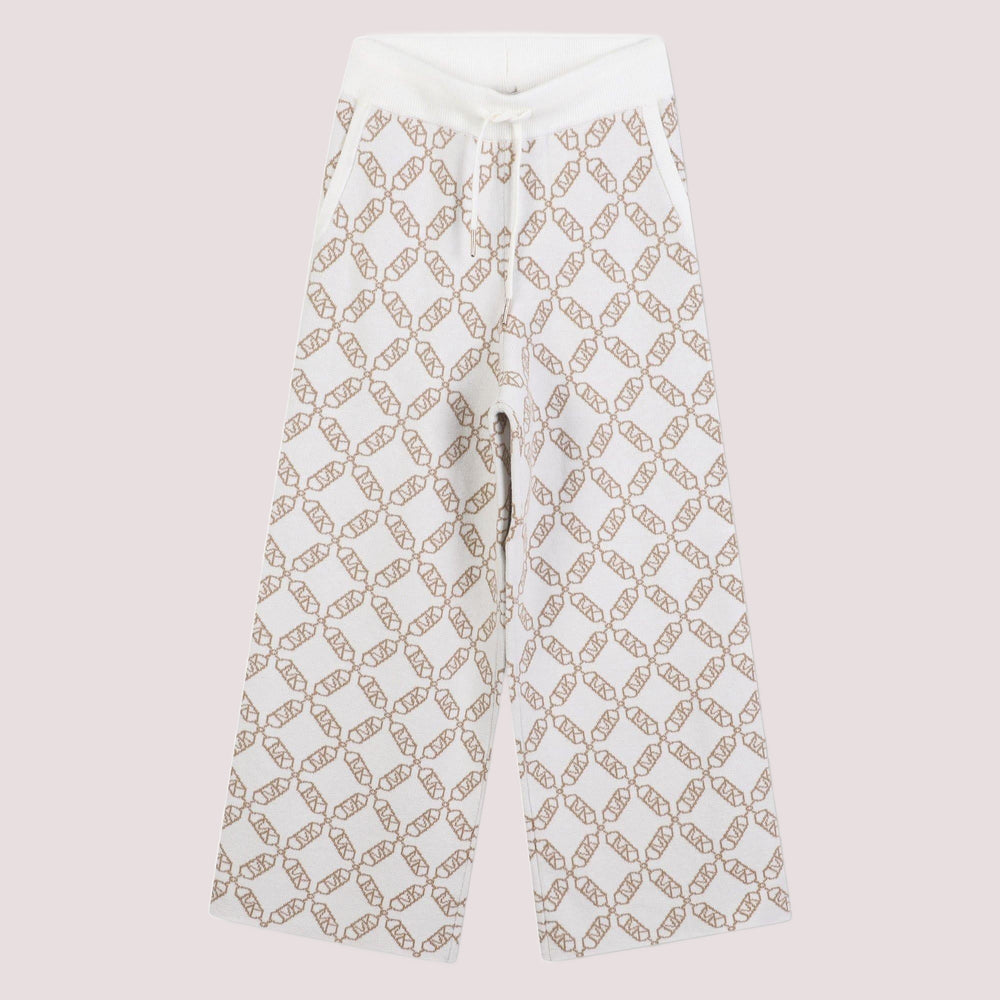Pantaloni sportivi per bambina Michael Kors Kids bianchi con monogramma R30452 /N52 MICHAEL KORS 