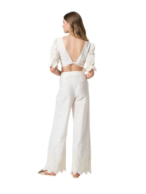 Pantaloni donna bianchi a gamba larga con ricami