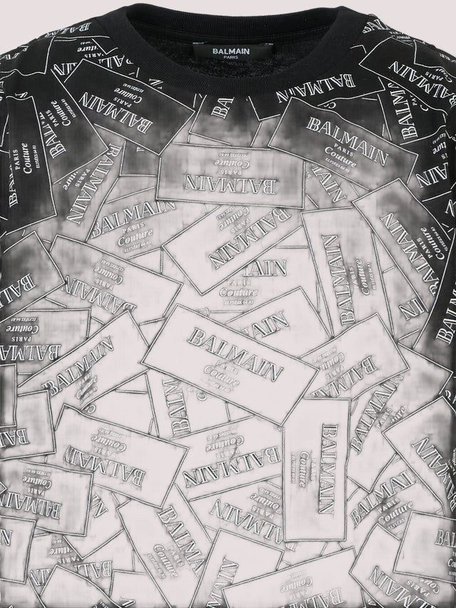 T-shirt nera per bambini con logo all over BX8Q11 Z3186 /930BC BALMAIN 