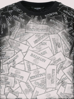 T-shirt nera per bambini con logo all over BX8Q11 Z3186 /930BC BALMAIN 
