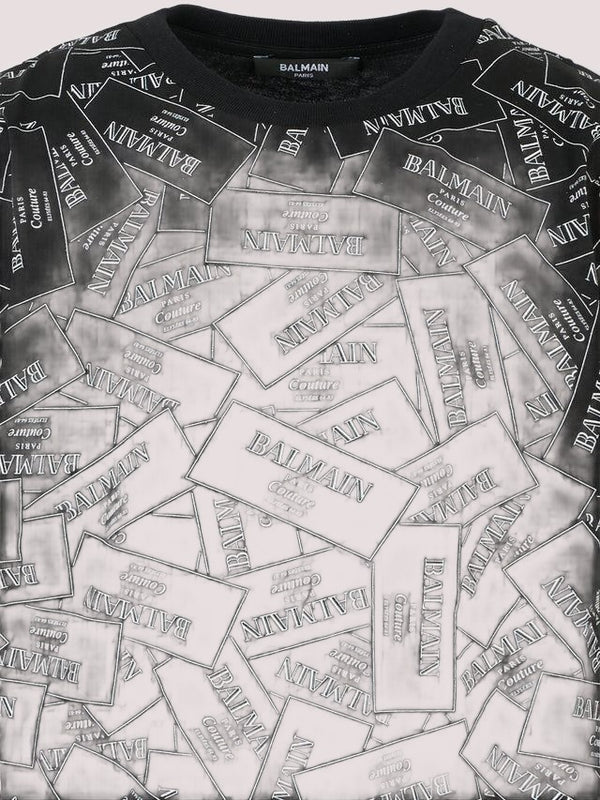 T-shirt nera per bambini con logo all over BX8Q11 Z3186 /930BC BALMAIN 