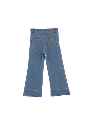 Jeans bambina flare in denim con orlo sfrangiato
