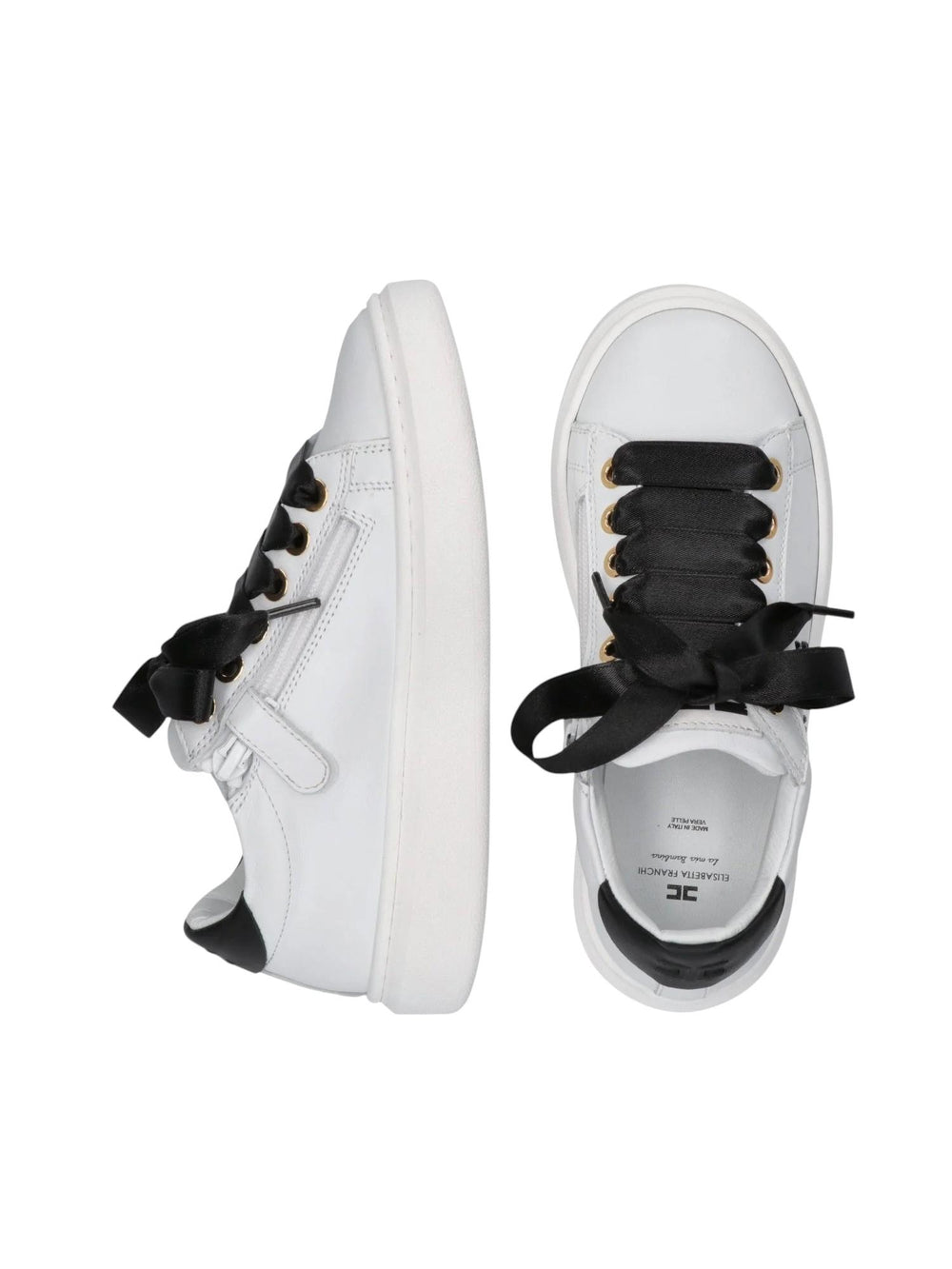 Sneakers bambina in pelle bianca e nera con fiocchi