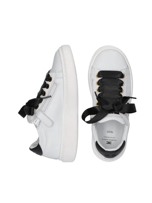 Sneakers bambina in pelle bianca e nera con fiocchi
