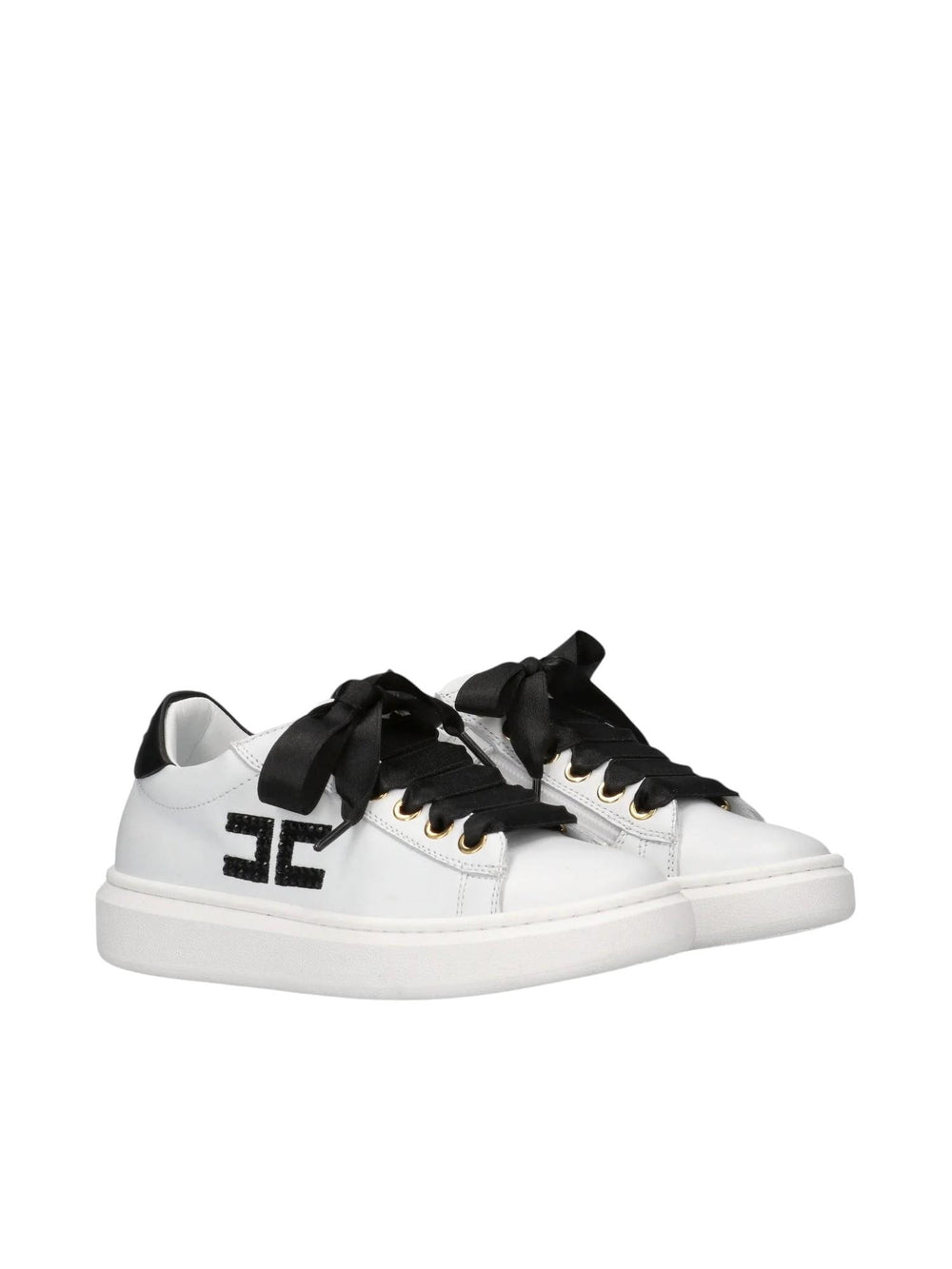Sneakers bambina in pelle bianca e nera con fiocchi
