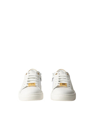 Sneakers bambina in pelle bianca e oro con zip e logo