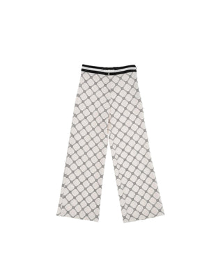 Pantaloni bambina panna a palazzo con stampa catena