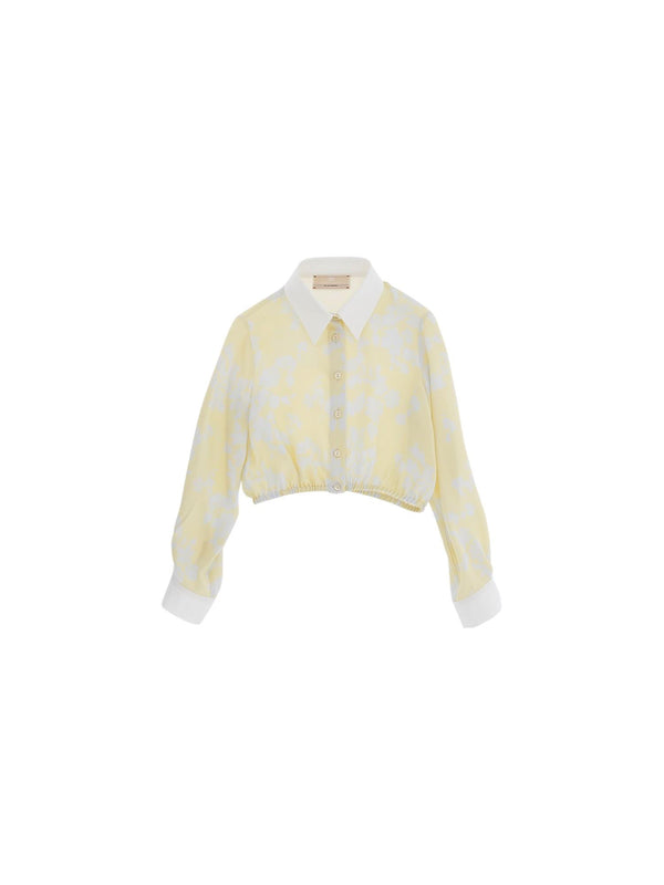 Camicia bambina gialla cropped con stampa floreale